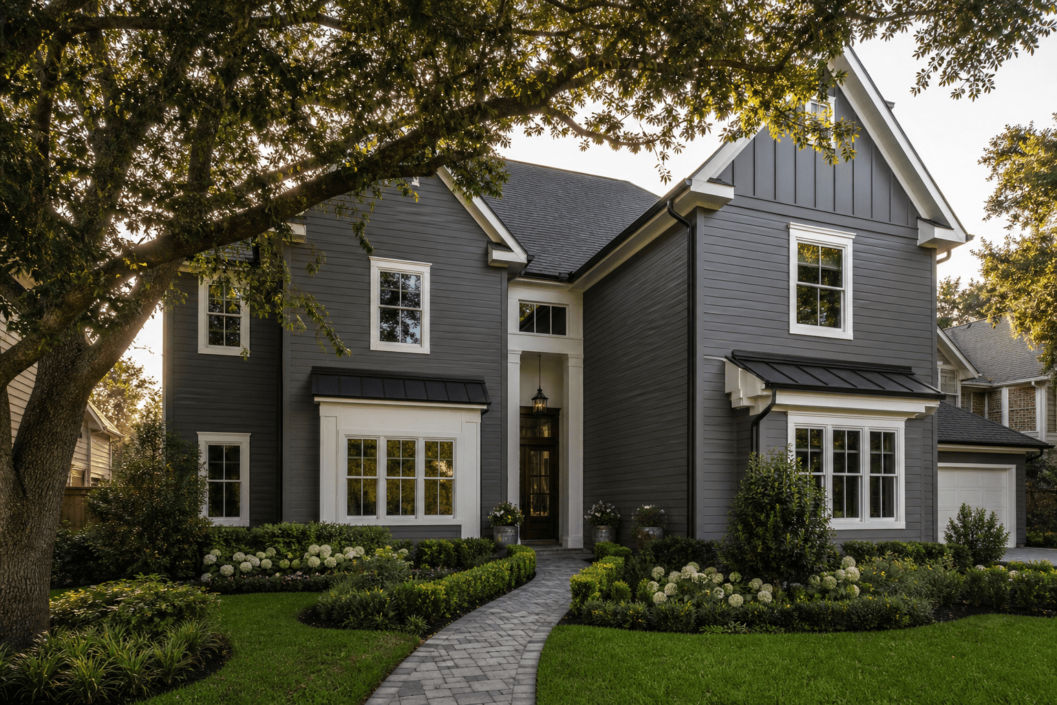 Houston home with brand-new James Hardie fiber cement siding in Iron Gray with white trim by Texas Premier Contractors
